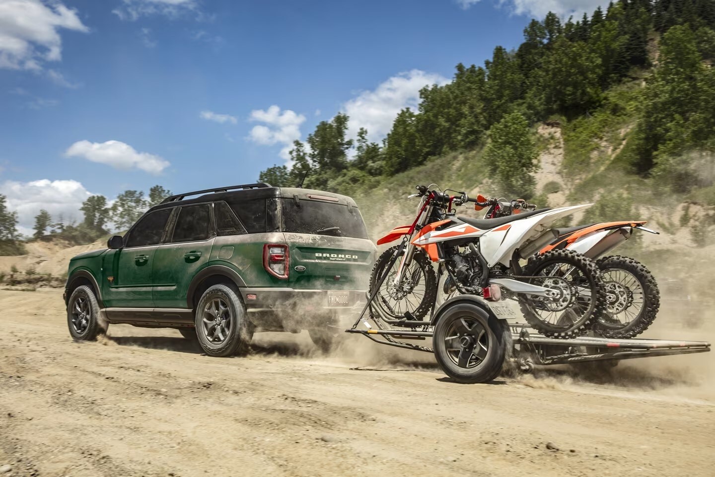 2024 Ford Bronco® Sport towing a trailer on a scenic road