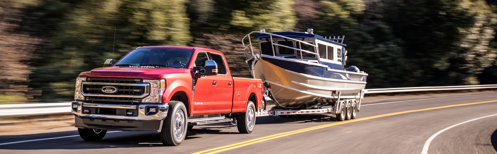 2022 Ford F250 King Ranch Towing a Boat.jpg