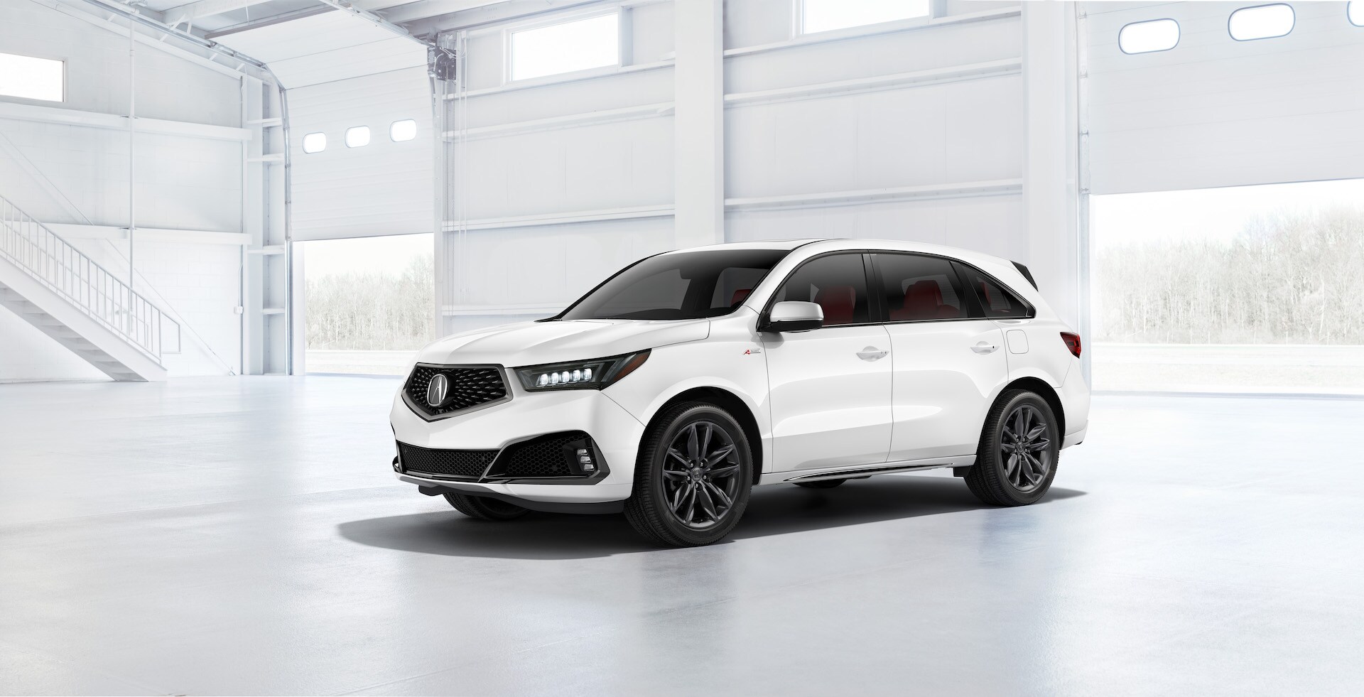 Compare the 2020 Lexus RX & the 2020 Acura MDX at Acura Hunt Valley | White 2020 Acrua MDX parked in garage