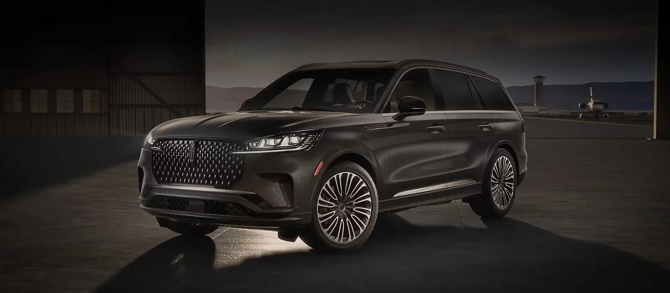 Front view of the 2026 Lincoln Aviator showcasing its bold grille