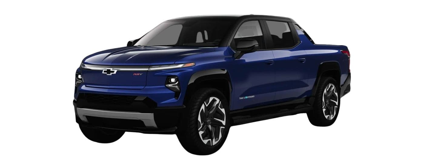 2024 Chevy Silverado EV RST - Model Left.jpg A blue 2024 Chevy Silverado EV RST is angled left.