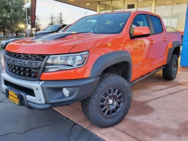 Custom orange crush Chevrolet Colorado ZR2 Bison with diesel motor