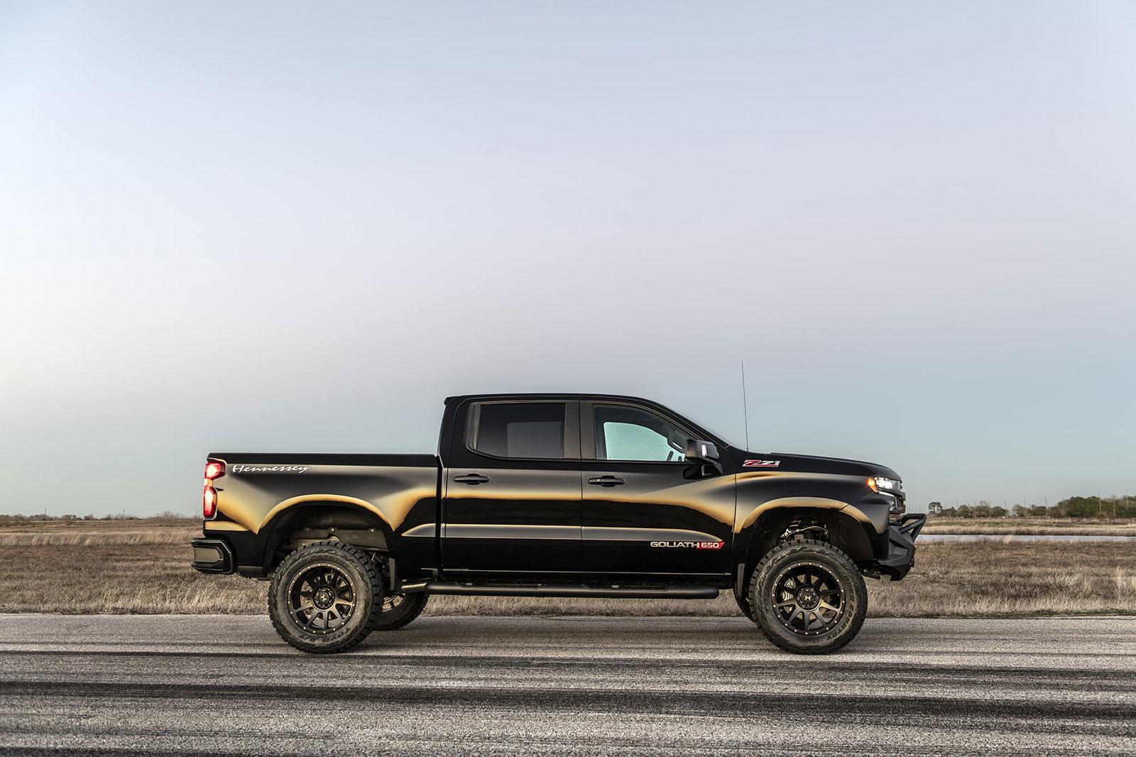 5c31050dec5e477c84282acfaf5d8ff0_1600x1066.jpg Shiny black Chevy Silverado with Hennessey Goliath  650 Supercharged upgrades, from driver's side