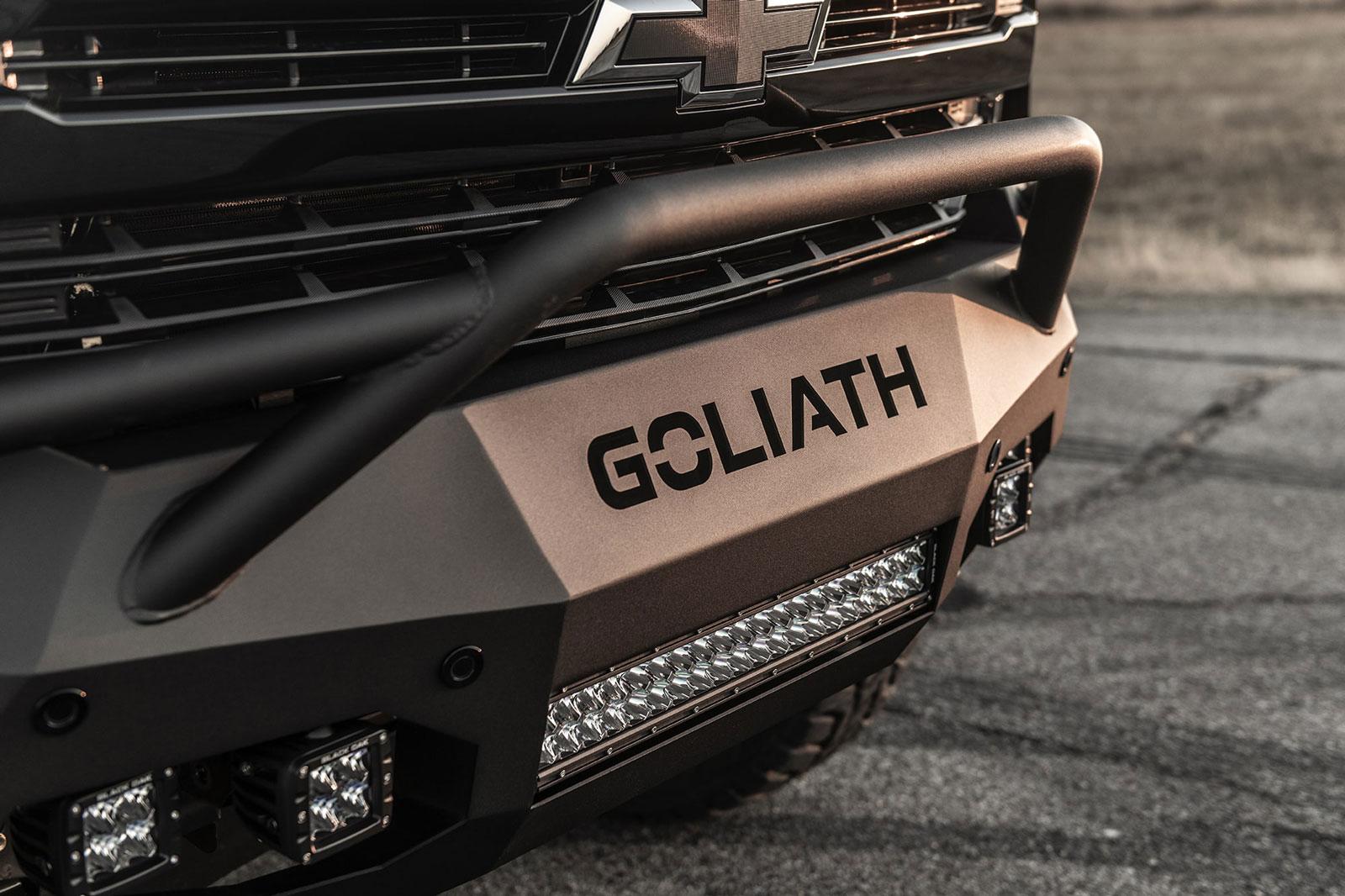 84a2c9e4b0e946d5beb3ba9fb9603f99_1600x1066.jpg Close-up of Hennessey Goliath badge on the front bumper of a supercharged black Chevy Silverado