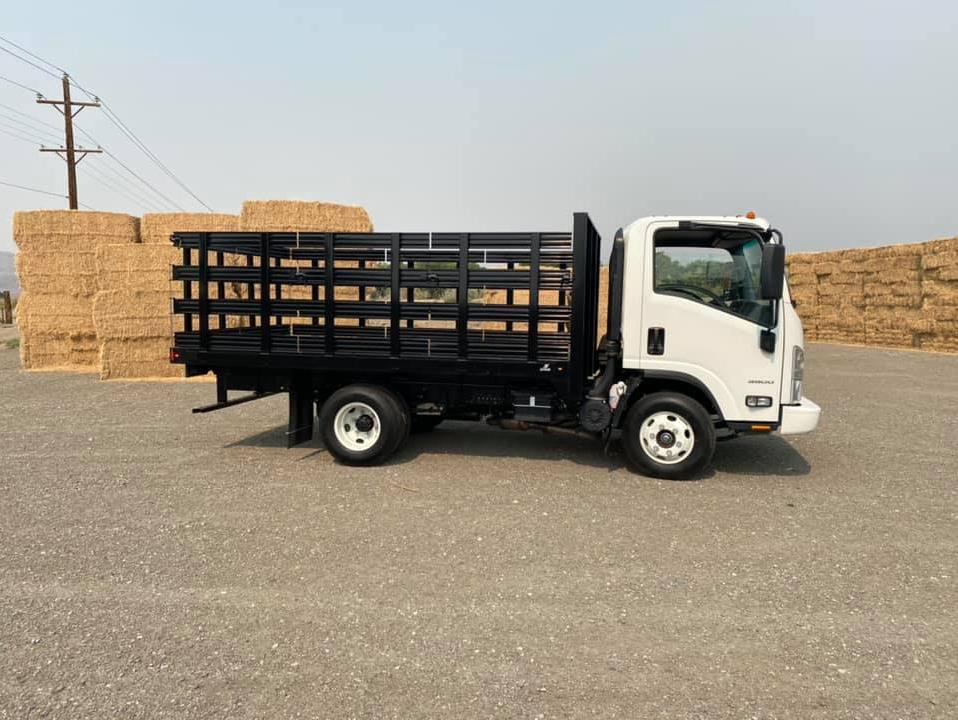 Custom White Chevrolet LCF truck with Knapheide hauler body side view