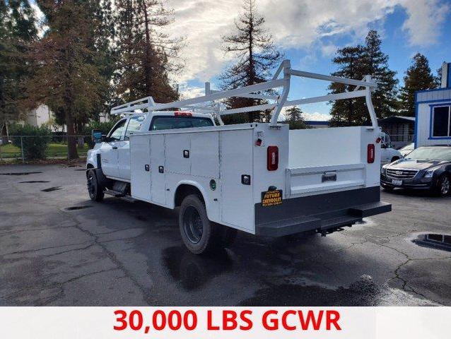 View from back of a white Chevy Silverado 5500HD work truck with Knapheide utility bed and 30,000lbs GCWR