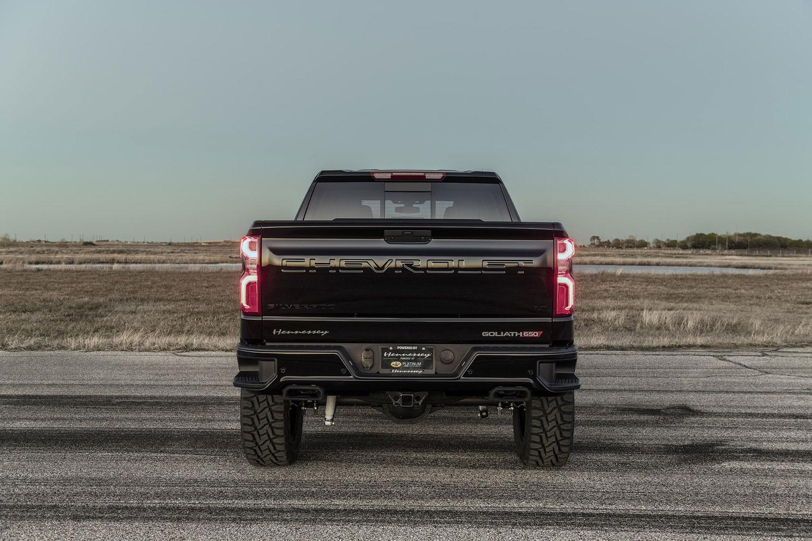 7ff483ea3fce486dbc322169ce1458f4_1600x1066.jpg Shiny black Chevy Silverado with Hennessey Goliath  650 Supercharged upgrades, from rear