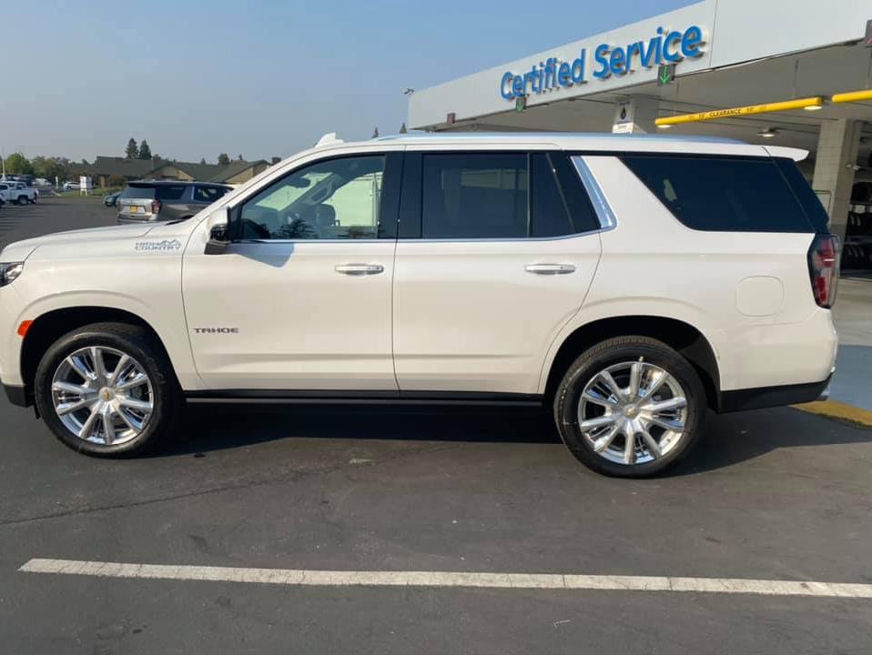 White High Country Chevrolet Suburban Custom Fleet Vehicle side view