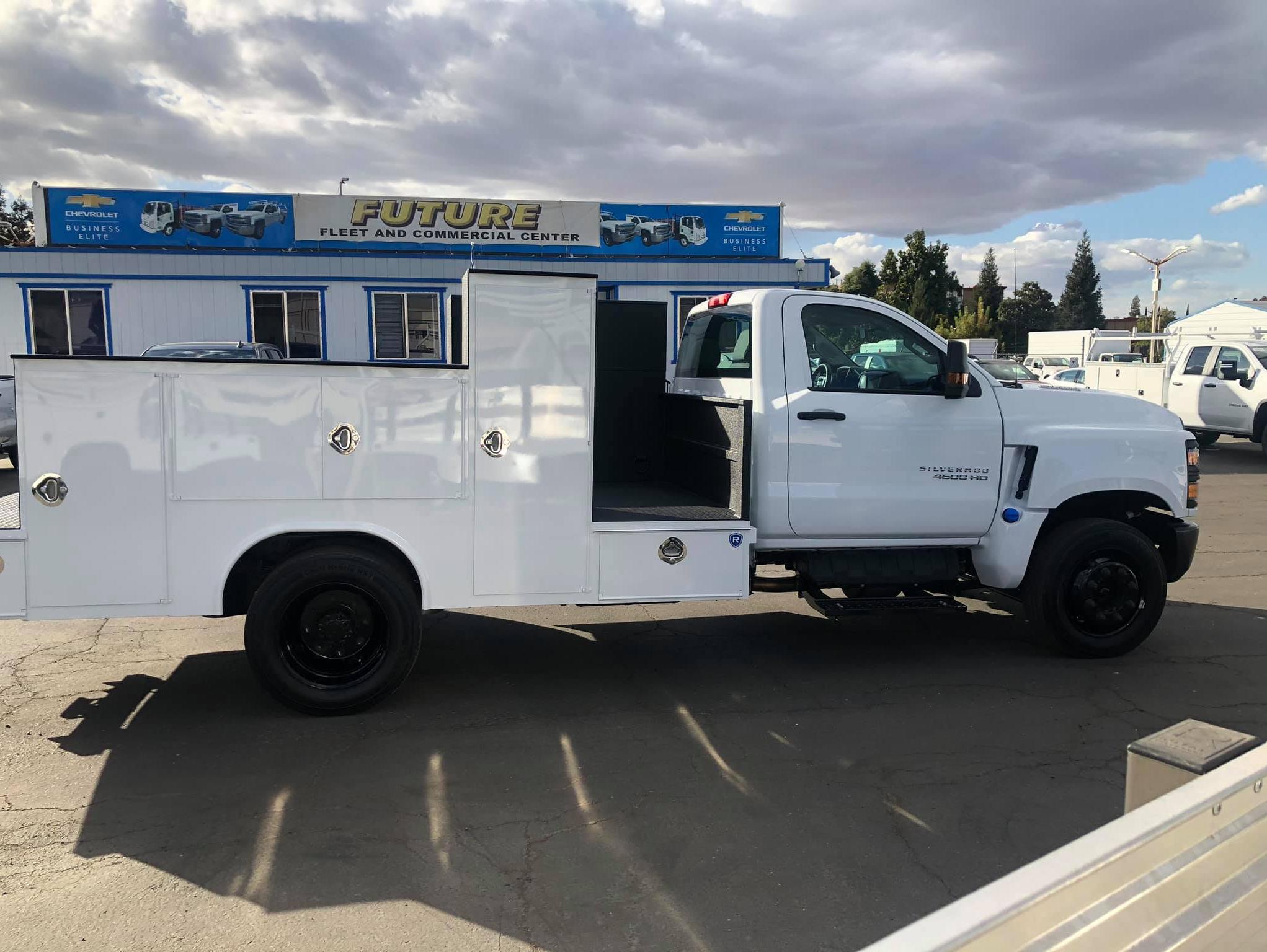 Side view of a white Chevy Silverado 4500HD with custom mechanics body