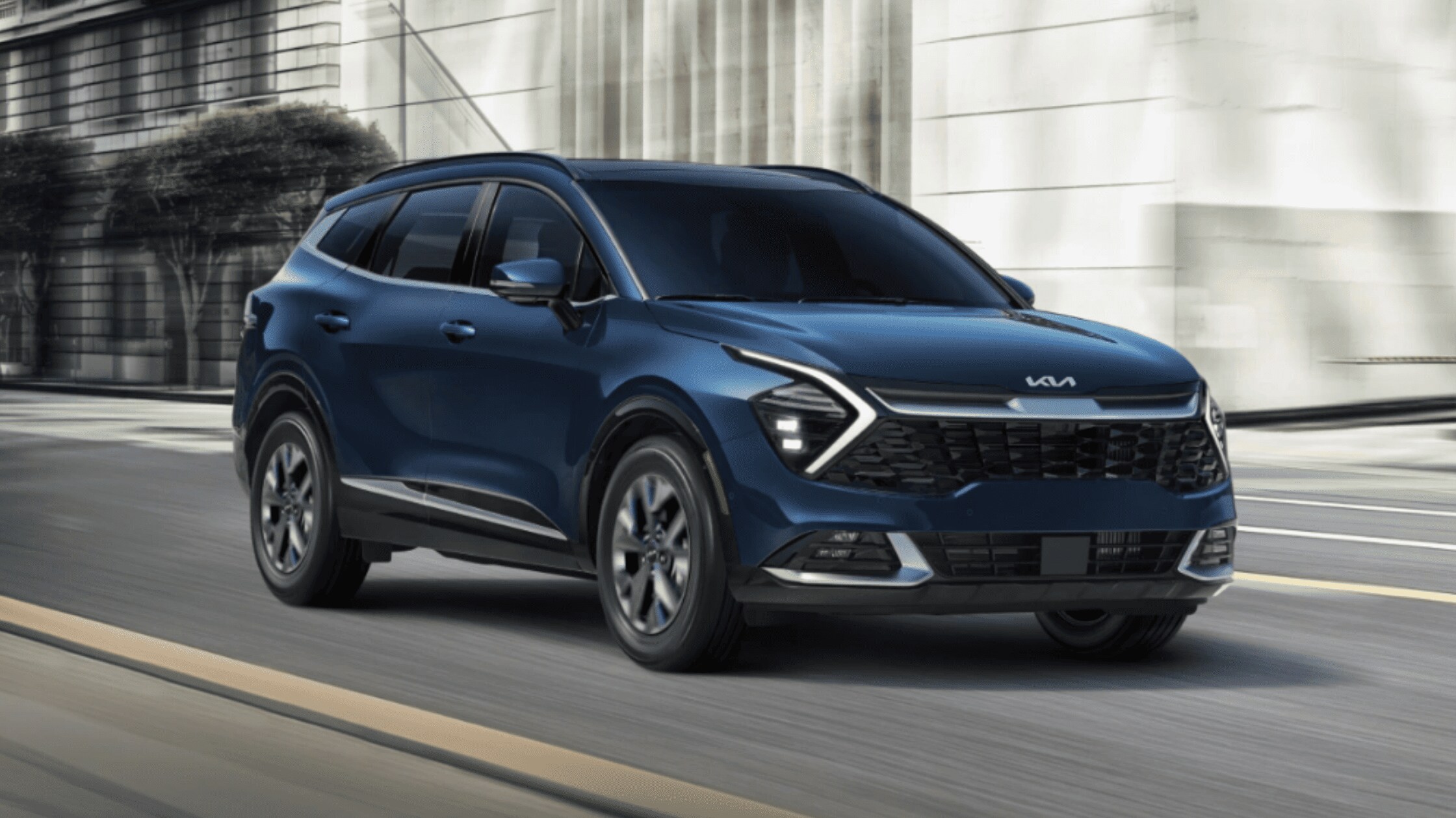 The 2024 Kia Sportage Hybrid near Port Charlotte, FL Stylish and eco-friendly 2024 Kia Sportage Hybrid cruising near Port Charlotte, FL, offering advanced hybrid performance for family trips and city commutes.