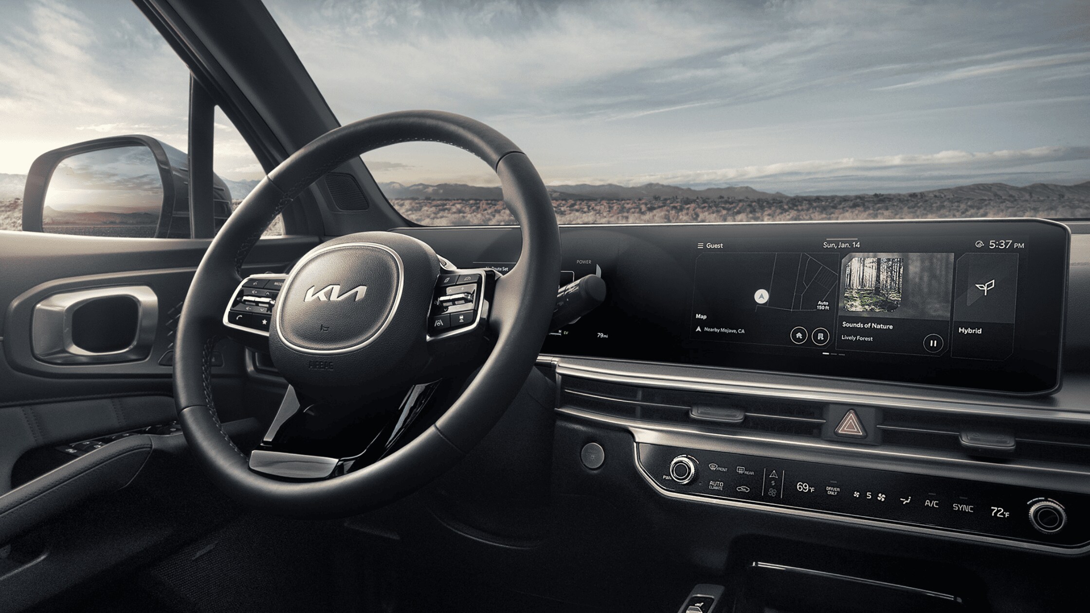 The 2024 Kia Sorento Hybrid near Port Charlotte, FL - Advanced Safety Features 2024 Kia Sorento Hybrid interior with sleek dashboard display and modern steering wheel, showcasing advanced technology and hybrid capabilities near Port Charlotte, FL.