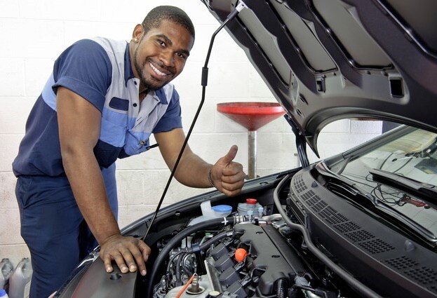technician working on vehicle at Garvey VW of Queensbury id=