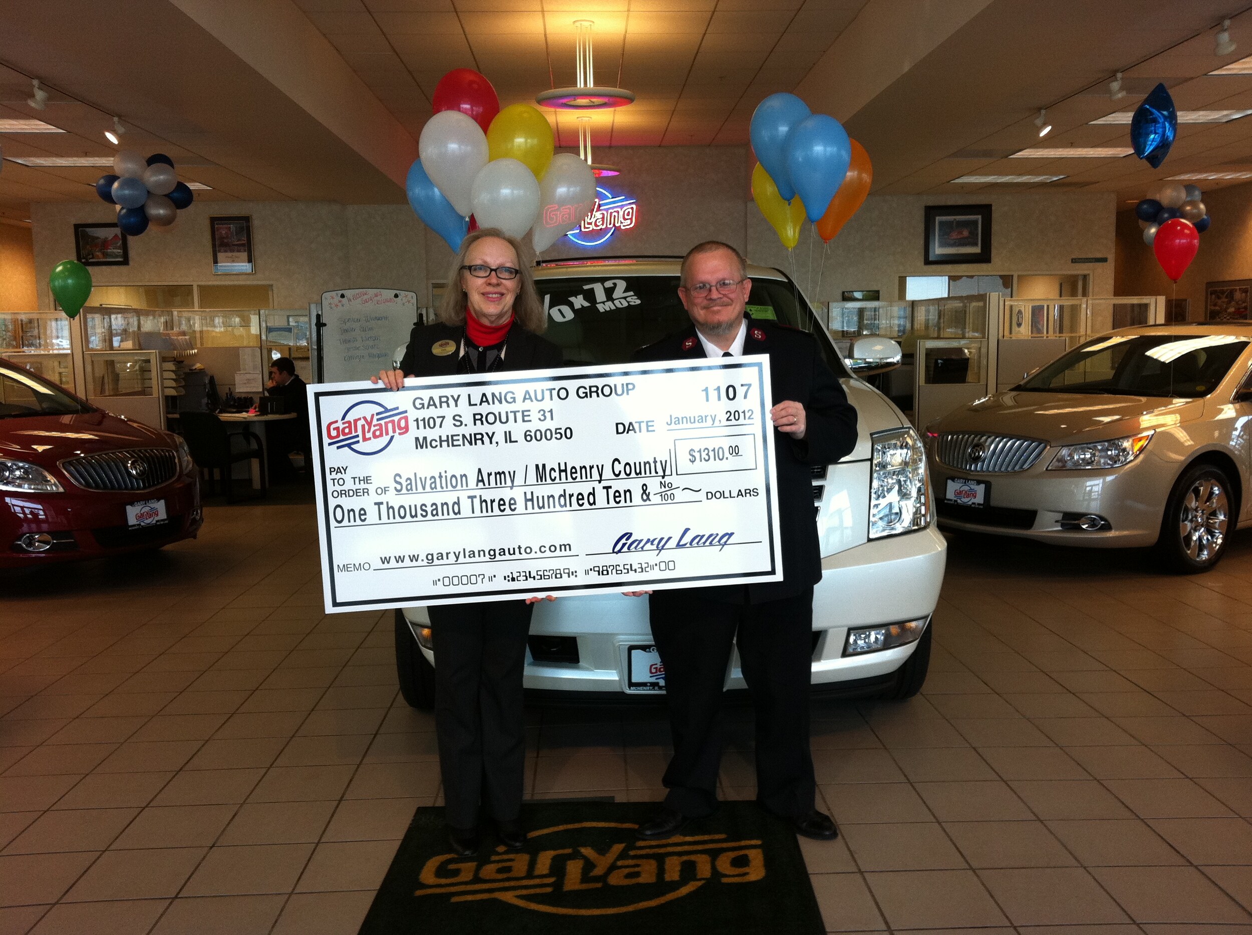 01 18 12 John Price Dixie Gilmore Salvation Army Donation.JPG