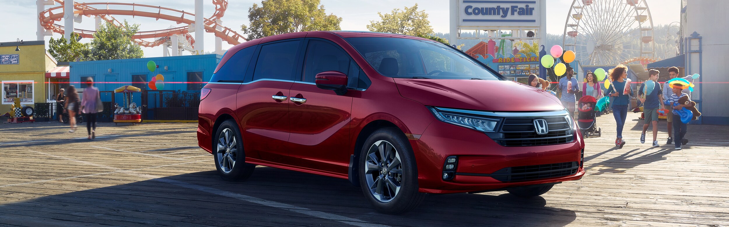 2022 Honda Odyssey Parked In Front Of Amusement Park 2022 Honda Odyssey Parked In Front Of Amusement Park