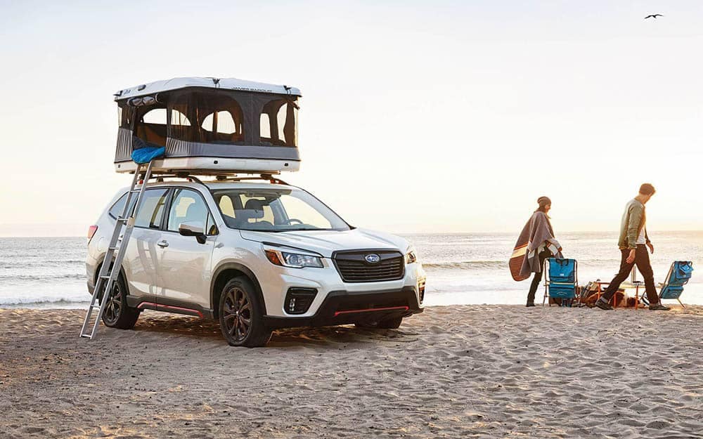 2019 Subaru Forester Parked at Beach with Pop Up Tent on Roof Rails
