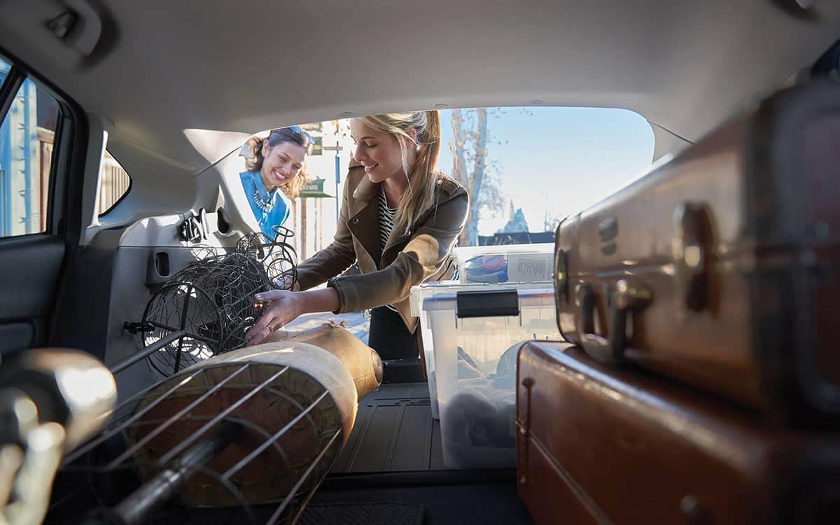 Girls Loading Cargo Area of a 2019 Subaru Crosstrek