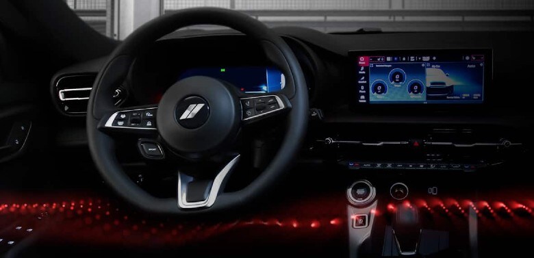 steering wheel and infotainment tech in the dodge hornet.jpg