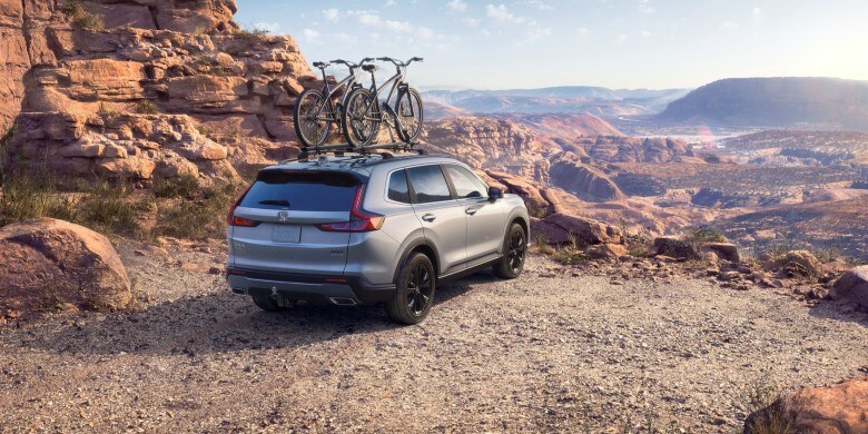Rear exterior view of the 2023 Honda CR-V Hybrid.jpg