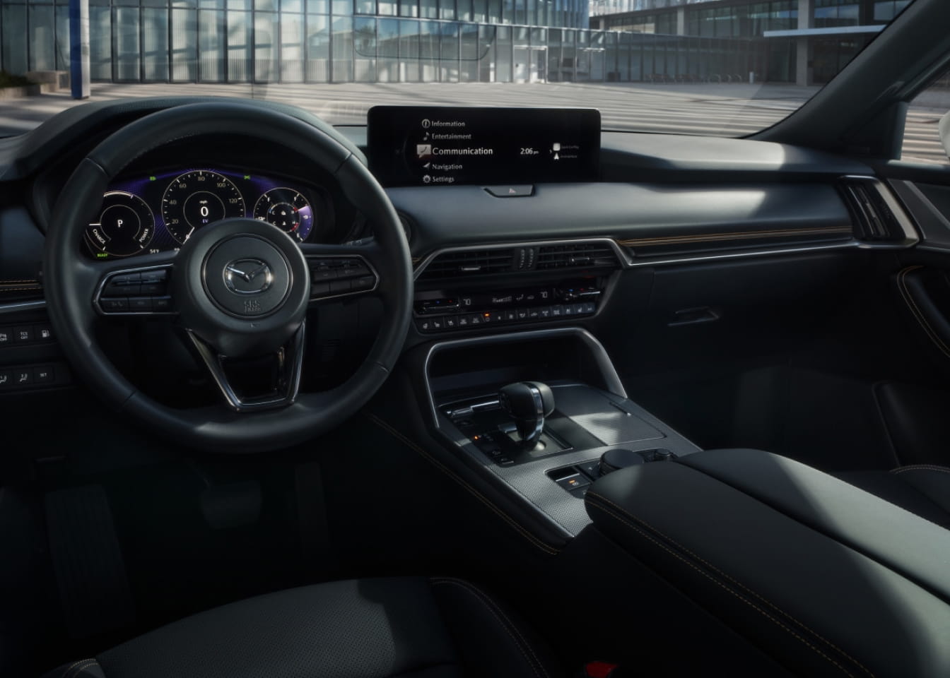 Mazda CX-90 dashboard with digital instrument cluster and center display.