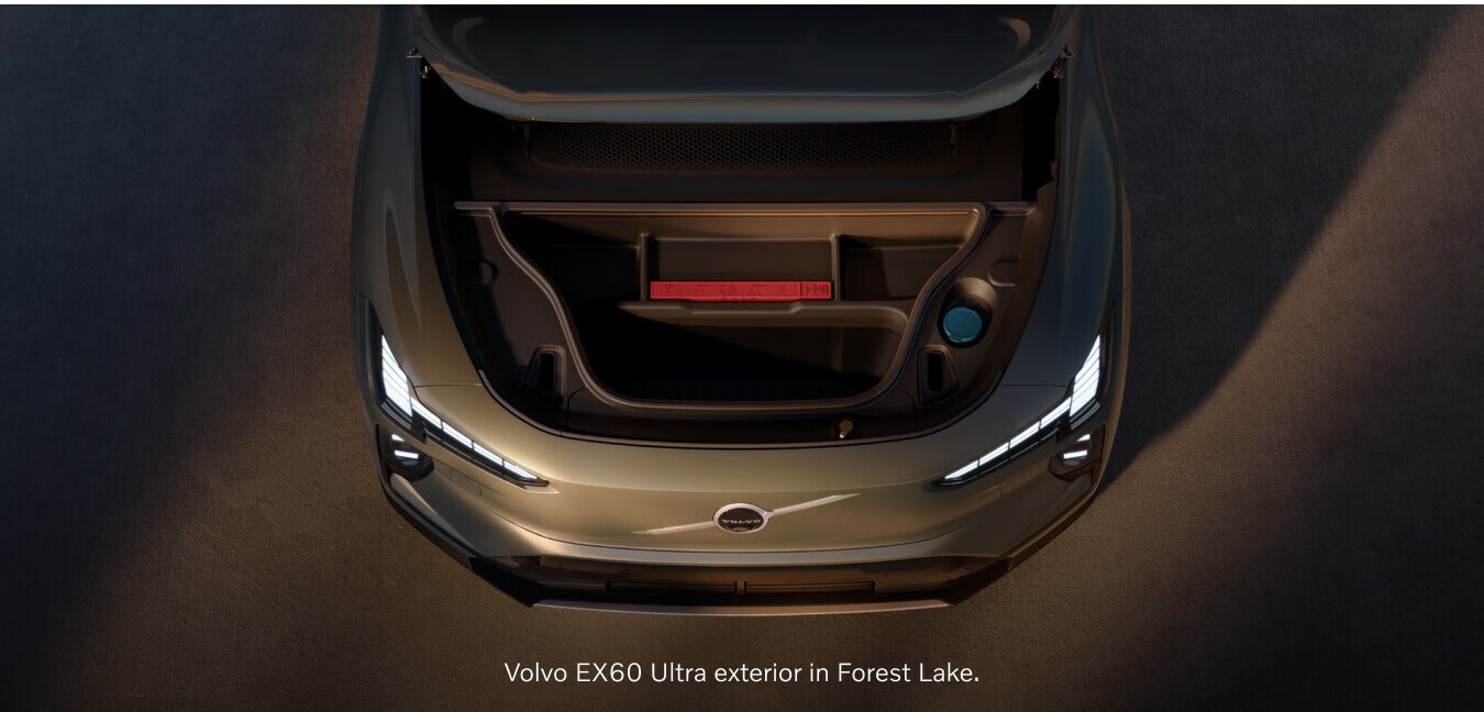 Top-down view of a green Volvo EX60 Ultra showcasing its open front trunk compartment storage.