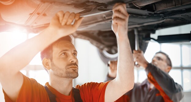 men-working-underneath-car-in-hemet.jpeg