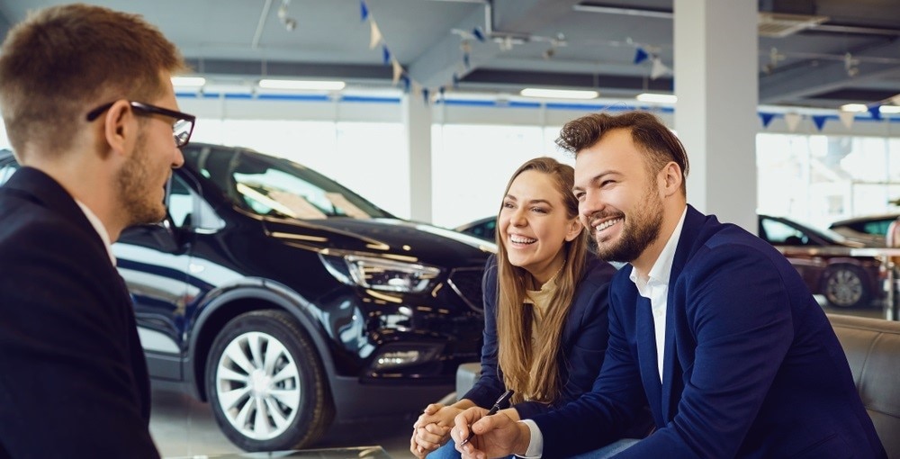 Couple talking with a Finance Specialist