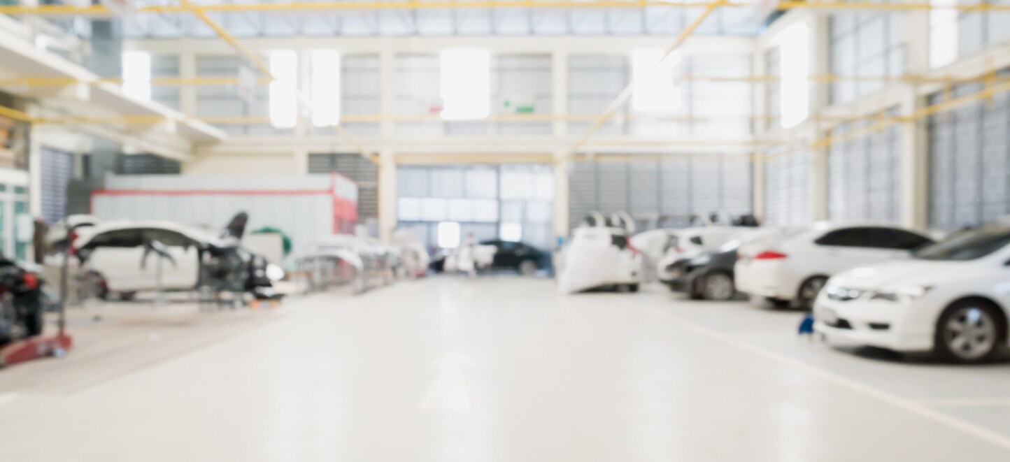 The inside of a vehicle service center. The inside of a vehicle service center.