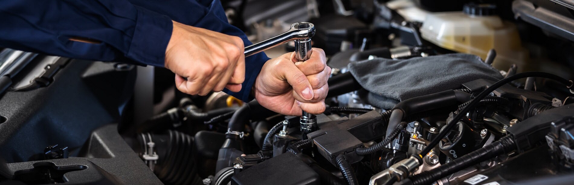 Technician Servicing Vehicle