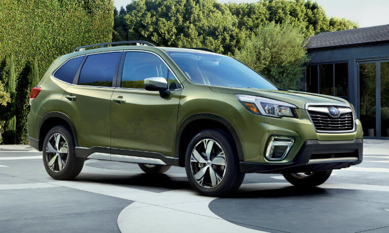 Green 2020 Subaru Forester parked in a drive way