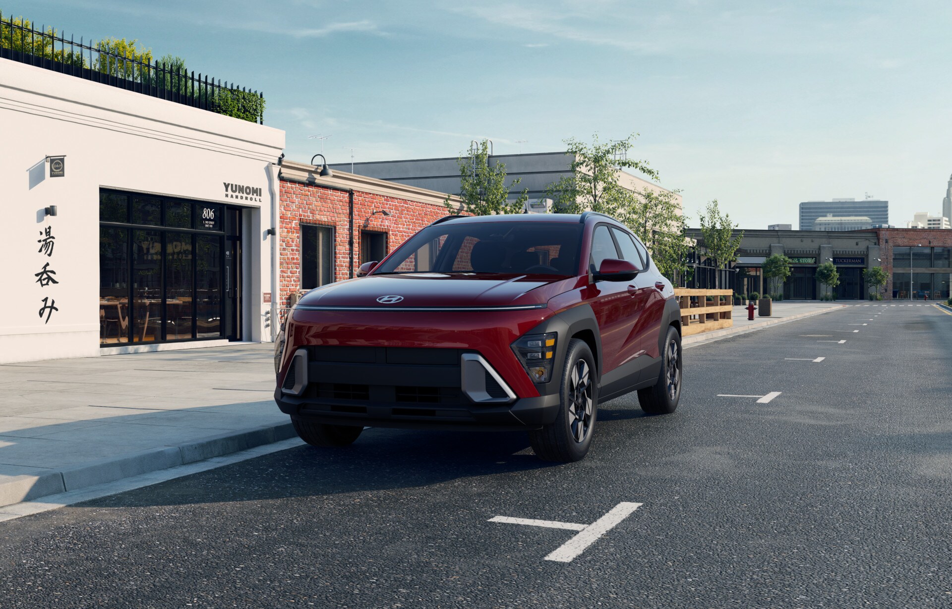 2025_Kona_ICE_SEL_CNV_FWD_UltimateRedPearl_BlackCloth_360_Landscape_ArtsDistrict.002.jpeg The 2025 Hyundai Kona with a Ultimate Red Exterior