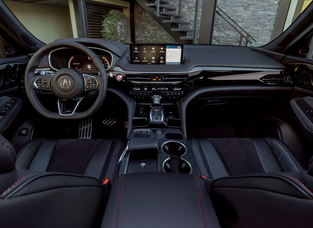 vue du volant, de la planche de bord et de la console centrale du Acura MDX 2022