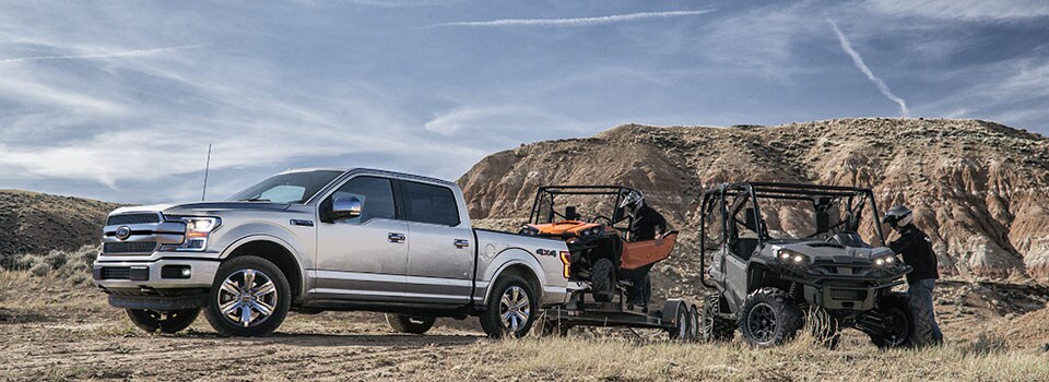 2019 Ford F-150 2019 Ford F-150 towing ATV's in field