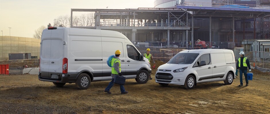 Test drive a Ford Commercial vehicle today Two Ford Transits at a construction site