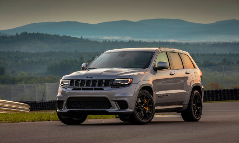 Gray 2020 Jeep Grand Cherokee on a racetrack