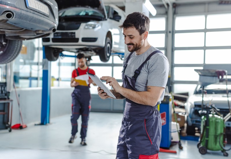 technician-examining-car.jpg