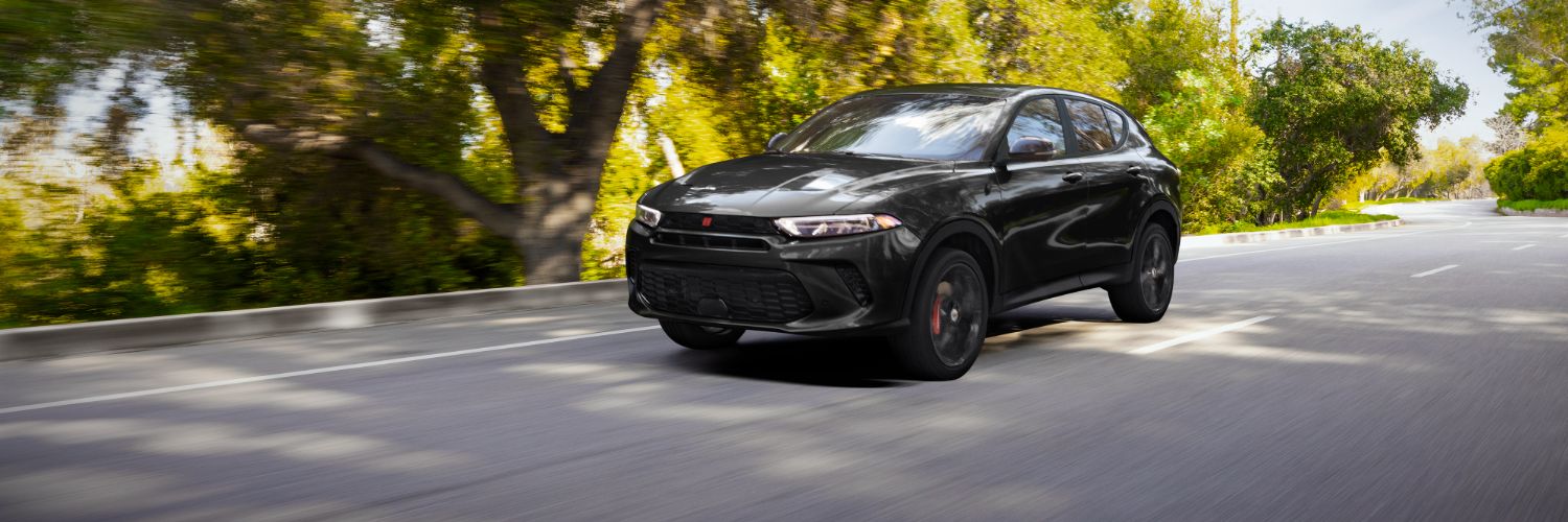 2025 Dodge Hornet Dodge Hornet driving on a road