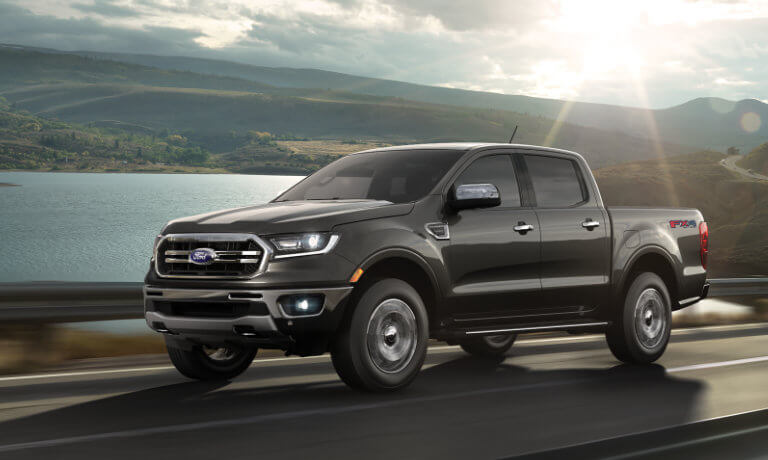 2021 Ford Ranger exterior driving on highway at sunset
