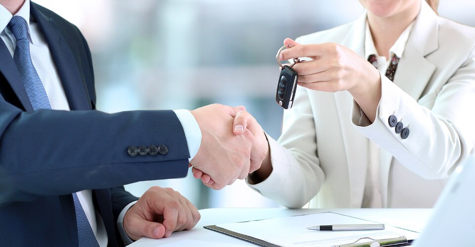 Car-saleswoman-handing-over-the-keys-for-a-new-car-479882056test.jpeg Incentives Main Image in Milwaukee, WI