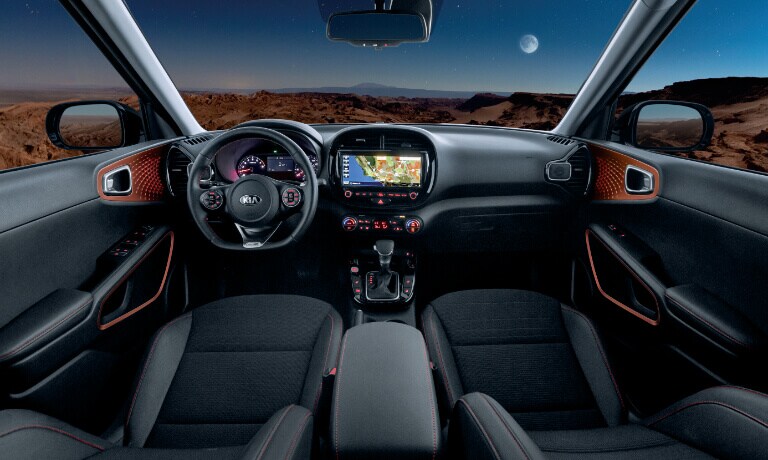 2020 Kia Soul interior in black two front seats showinf the fron dash