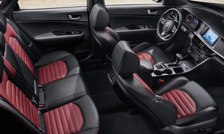 2020 Kia Optima interior in black and red showing top view of the seating