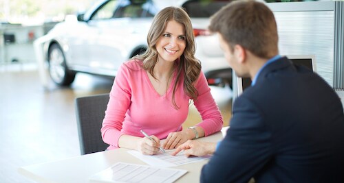 Finance signing paperwork.png
