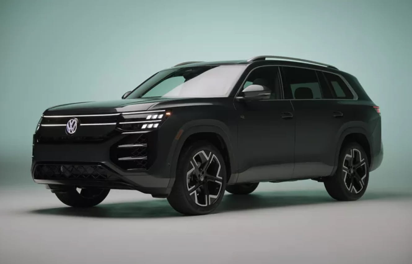 2027 Volkswagen Atlas shown from a front three-quarter view on a light green studio background.