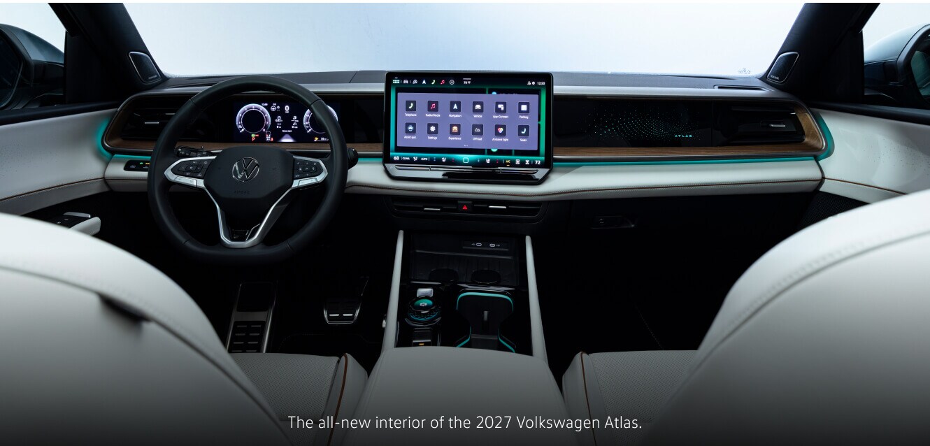 Interior dashboard view of a 2027 Volkswagen Atlas SEL R-Line highlighting its large central touchscreen.