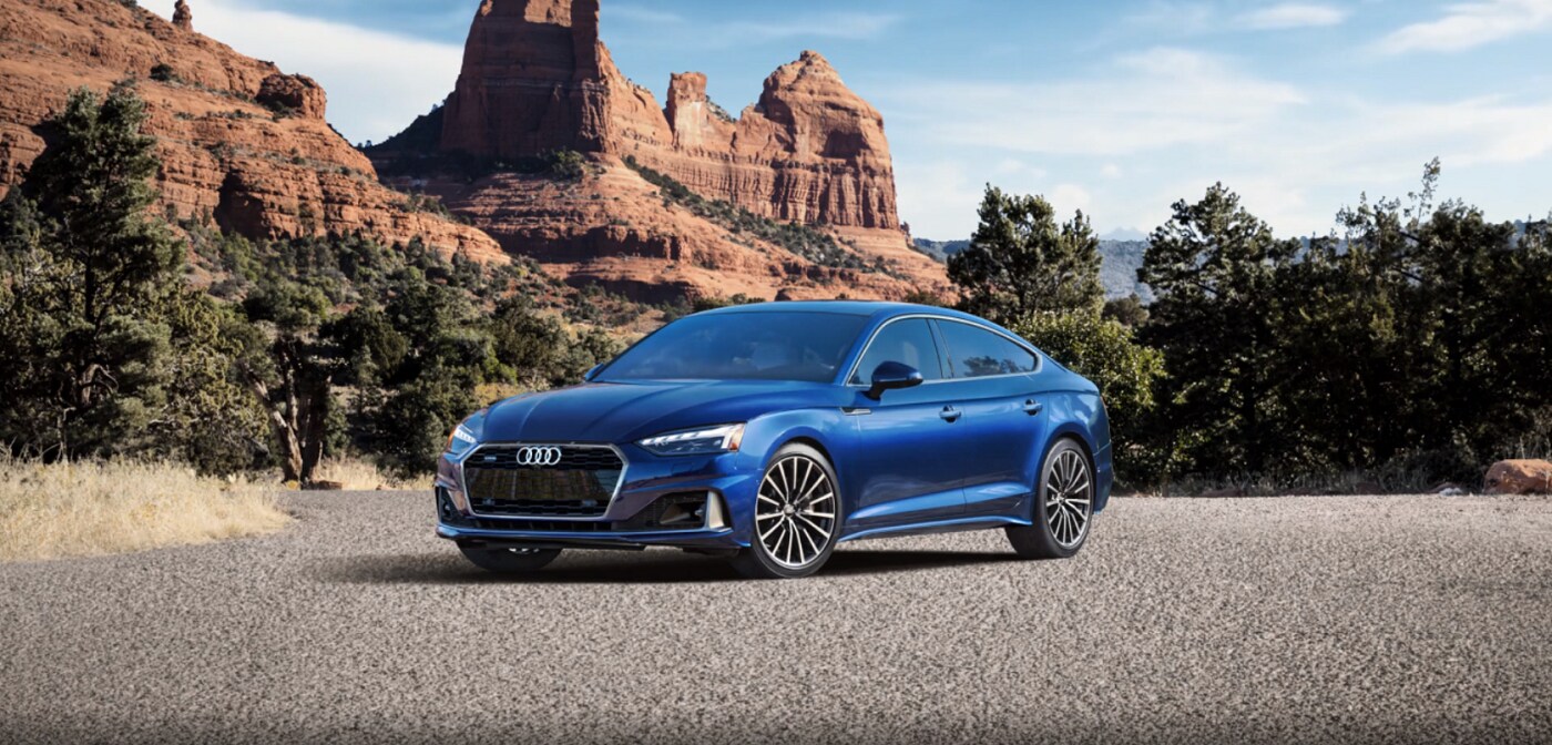 Audi_A5_Sportback_Parked_With_Mountain_Background.png