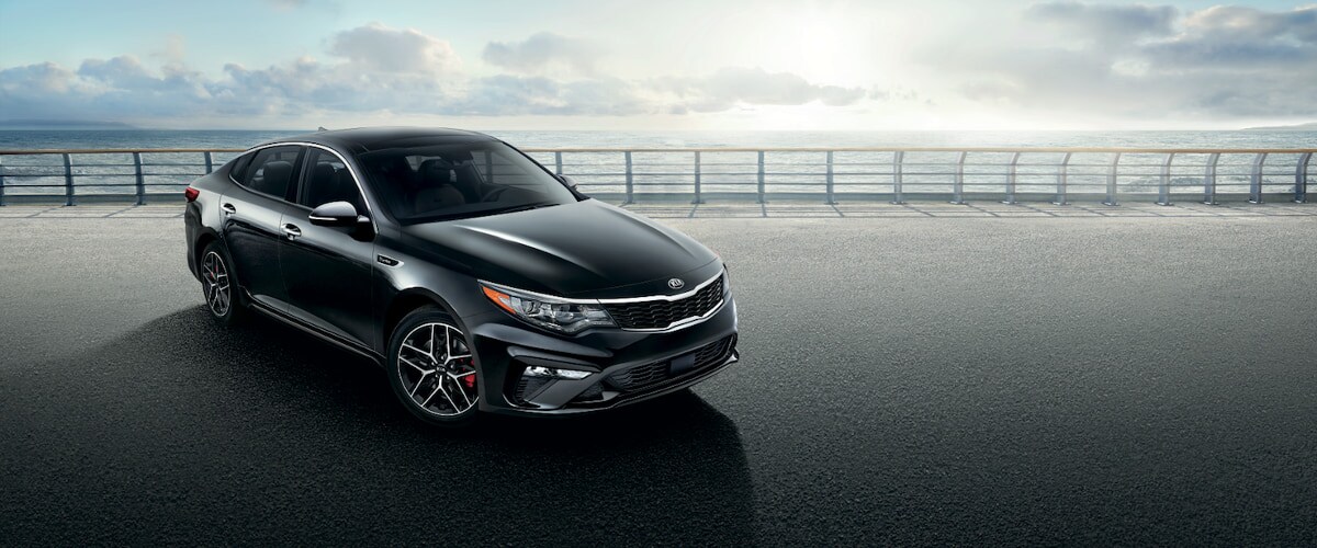 2020 Kia Optima 2020 Kia Optima parked in front of the ocean