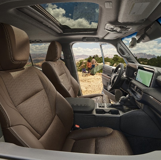 2024 Toyota Land Cruiser at Haddad Toyota in Pittsfield, MA | Interior look at the 2024 Toyota Land Cruiser with brown seats