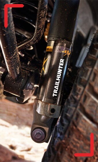 2024 Toyota Tacoma at Haddad Toyota in Pittsfield, MA | Close up of Trail Hunter edition suspension on a 2024 Toyota Tacoma