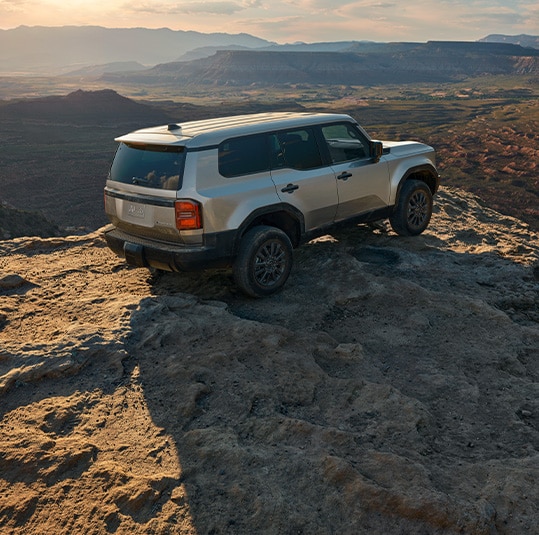 2024 Toyota Land Cruiser at Haddad Toyota in Pittsfield, MA | Rear profile of a 2024 Toyota Land Cruiser in color grey