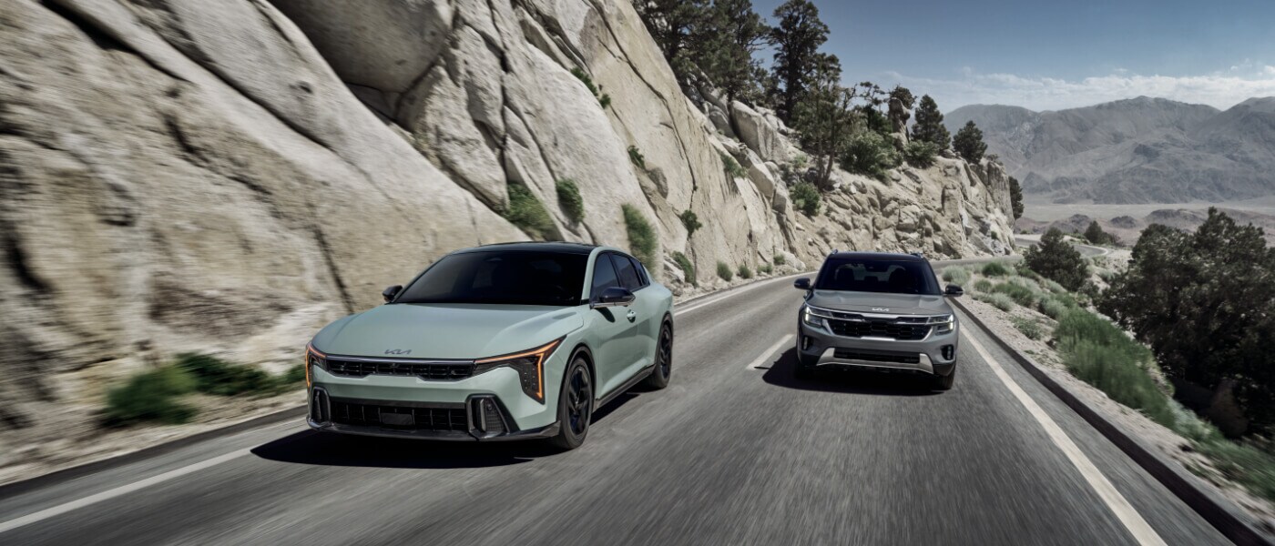 2025 Kia K4 Exterior Two Driving In Mountains