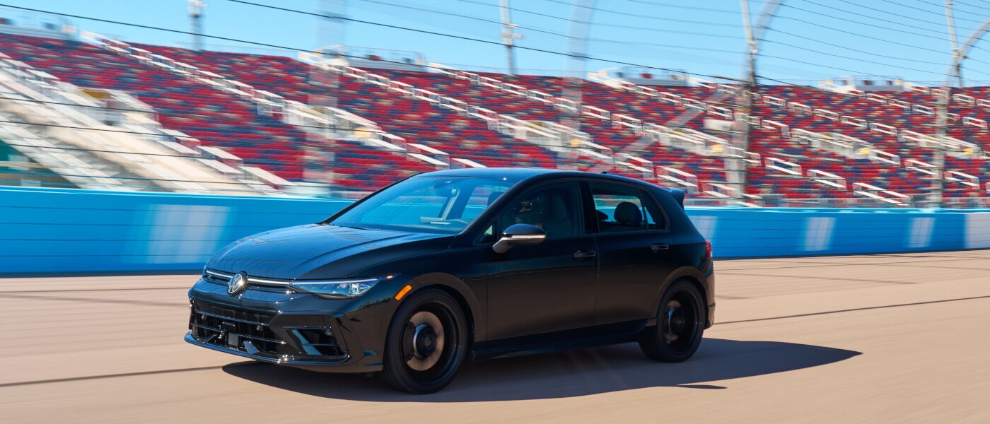 2025 Volkswagen Golf R driving on a racetrack
